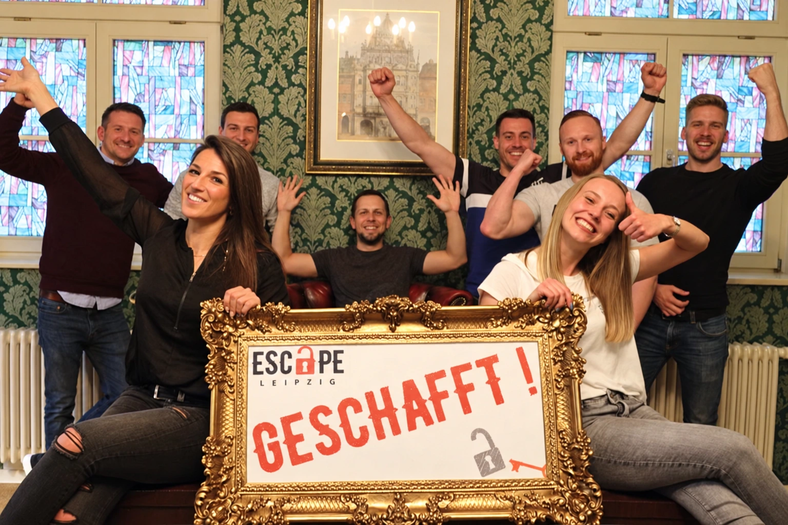Friends celebrate solving their escape room